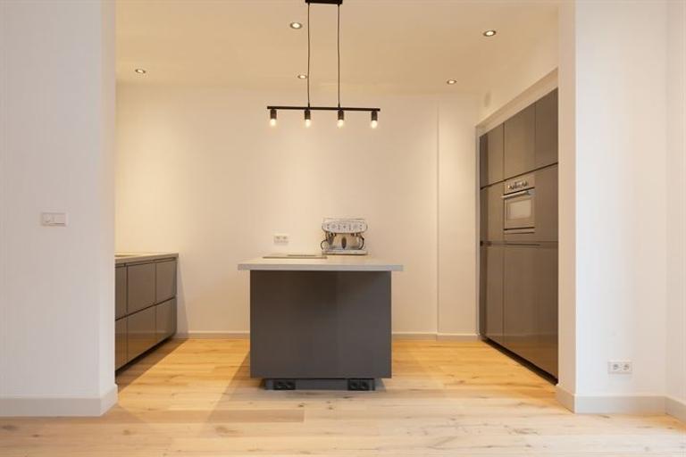 Parterrewoning van 169 m² met tuin en lift - Afbeelding 9