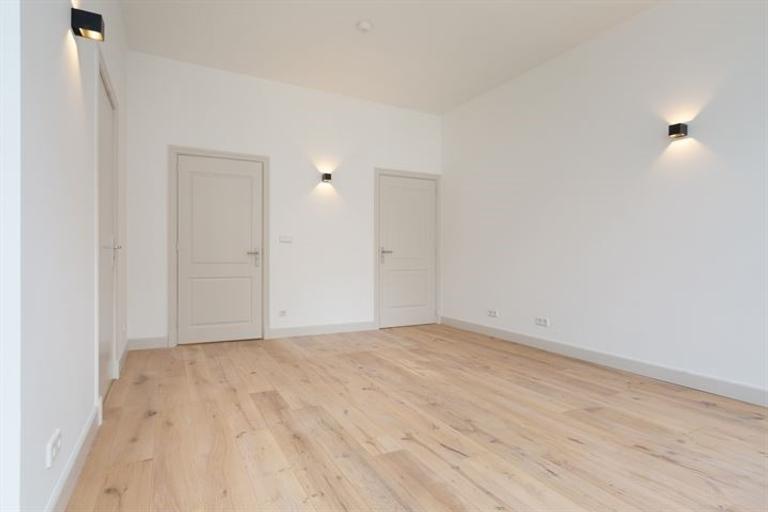 Parterrewoning van 169 m² met tuin en lift - Afbeelding 26