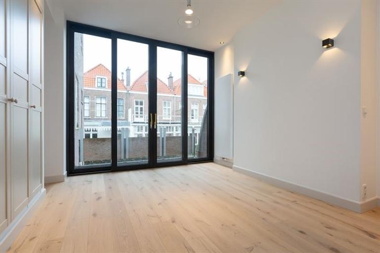 Parterrewoning van 169 m² met tuin en lift - Afbeelding 35