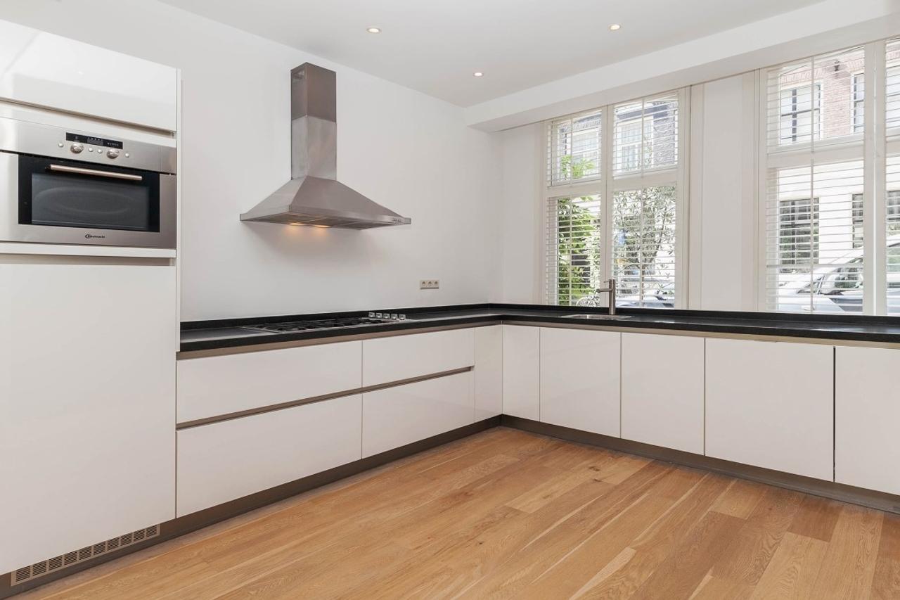 Dubbel benedenhuis met tuin bij Vondelpark - Afbeelding 9