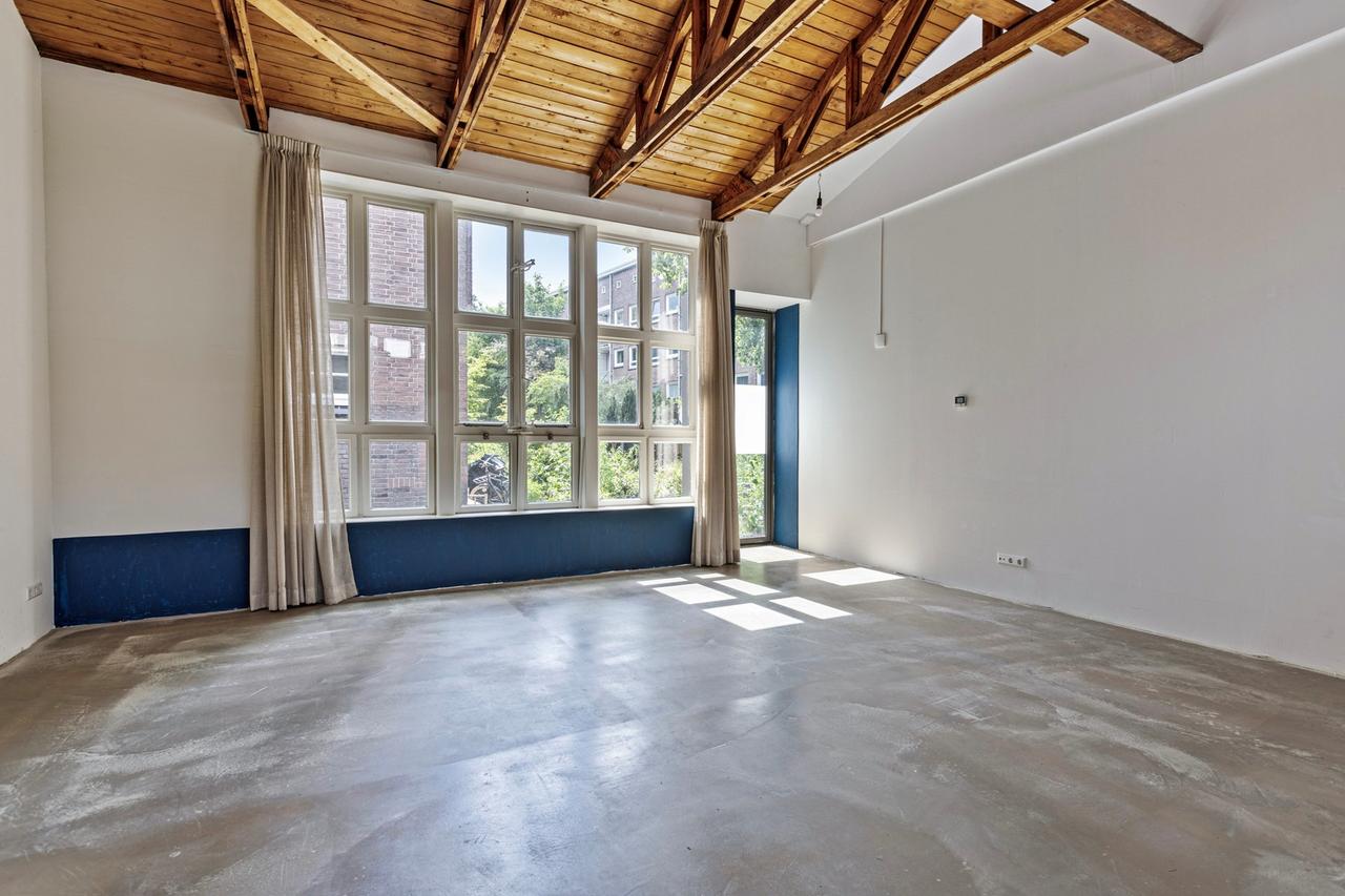 Licht 2-kamerappartement met grote tuin - Afbeelding 1