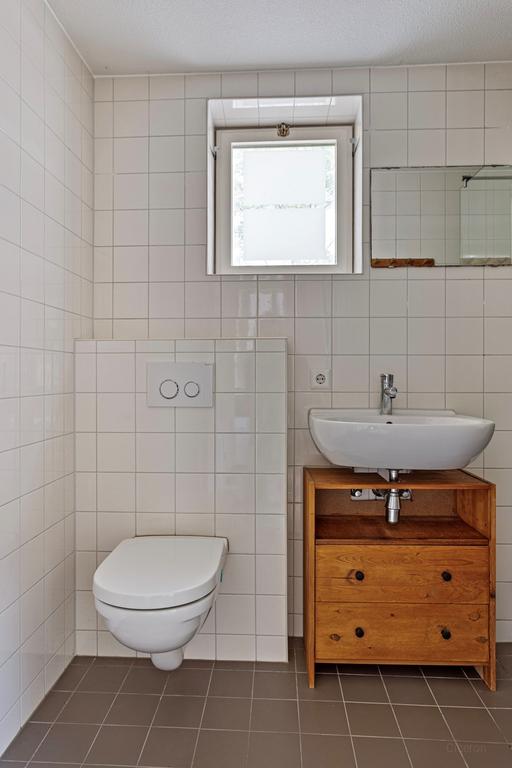 Licht 2-kamerappartement met grote tuin - Afbeelding 9