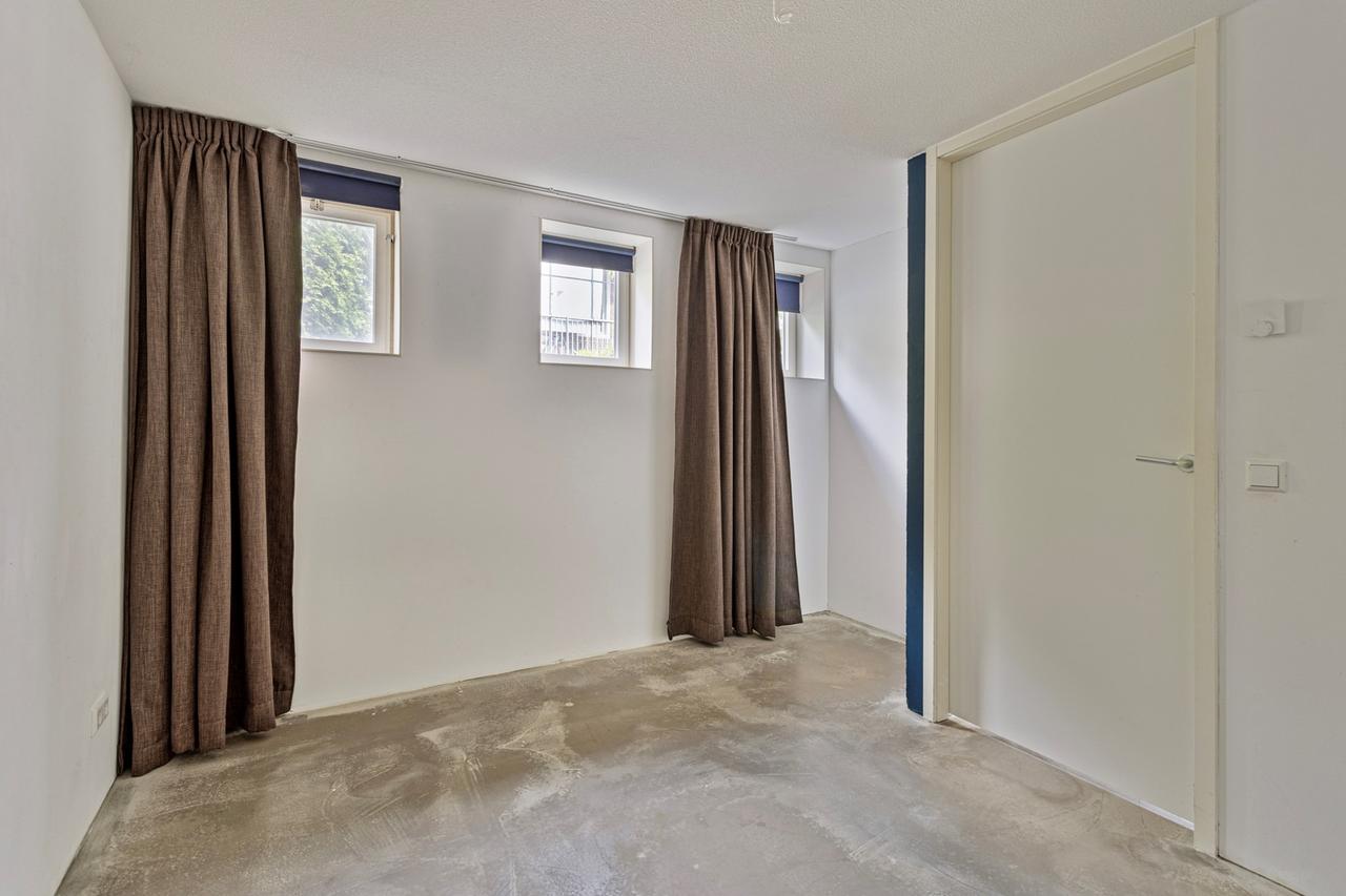 Licht 2-kamerappartement met grote tuin - Afbeelding 10