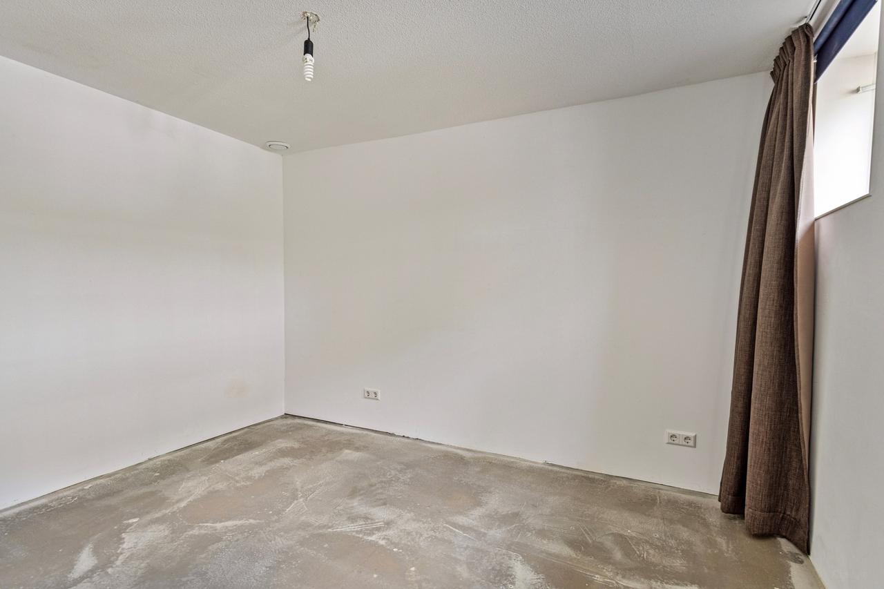 Licht 2-kamerappartement met grote tuin - Afbeelding 11