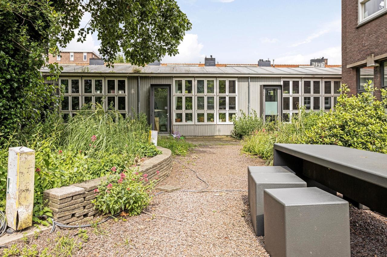 Licht 2-kamerappartement met grote tuin - Afbeelding 12