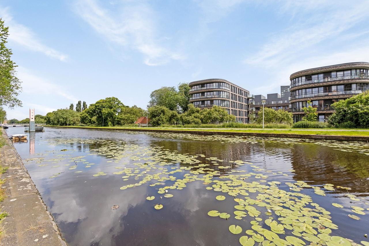 Licht 2-kamerappartement met grote tuin - Afbeelding 16