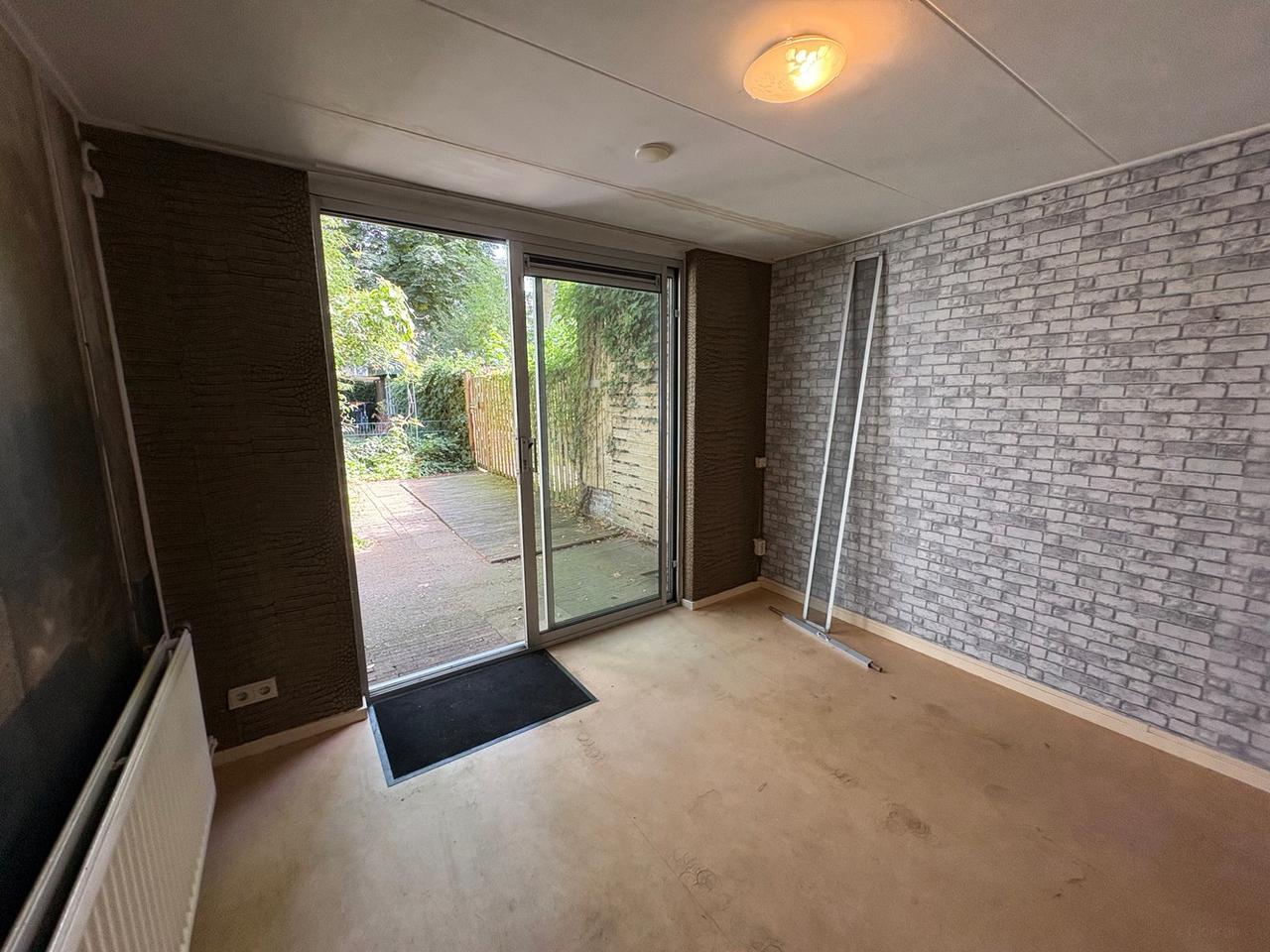 Souterrain met royale woonkeuken en tuin - Afbeelding 21