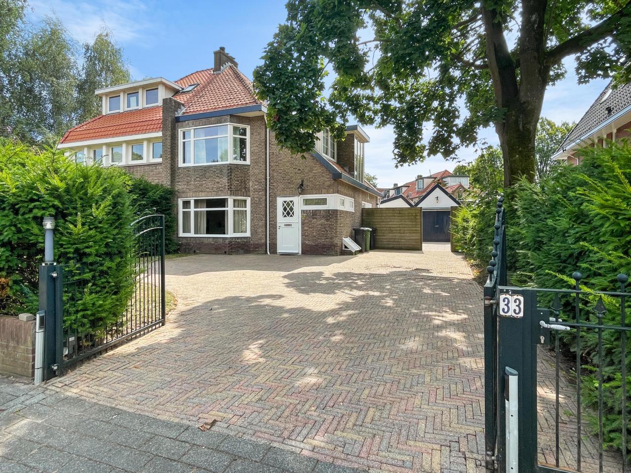 4-slaapkamer huis met tuin en garage - Afbeelding 1