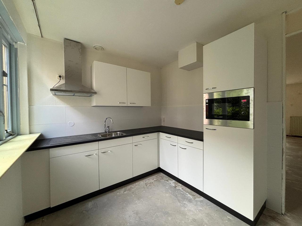 94 m² woonruimte met 3 slaapkamers - Afbeelding 3