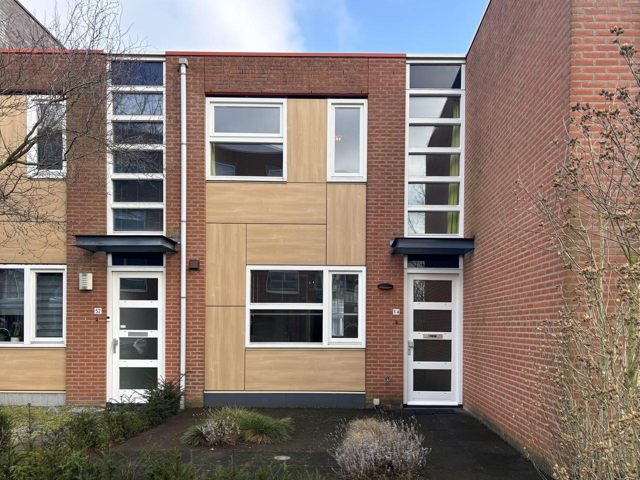 Tussenwoning met tuin vlak bij ASML - Afbeelding 2