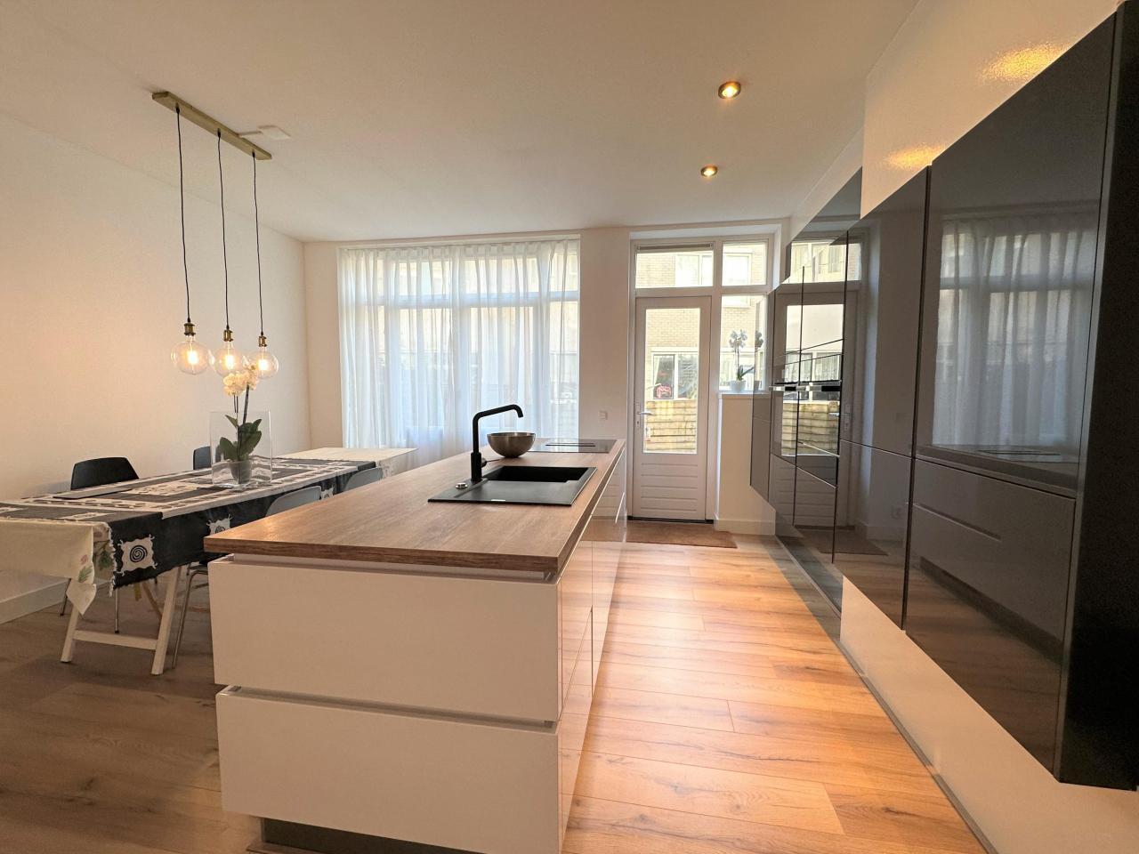 Dubbele benedenwoning met tuin in Kralingen - Afbeelding 4