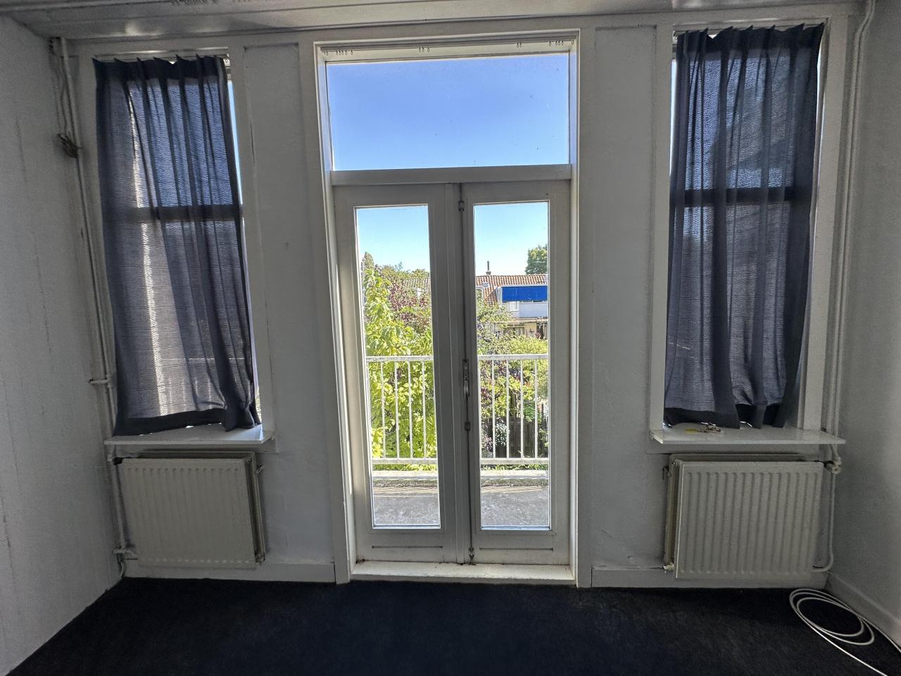 4-kamer appartement met balkon in Overschie - Afbeelding 4