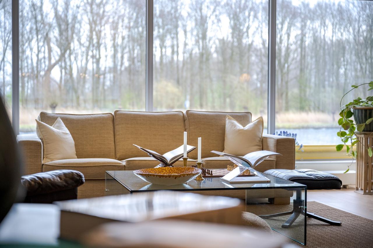 Vrijstaande watervilla met eigen steiger - Afbeelding 2