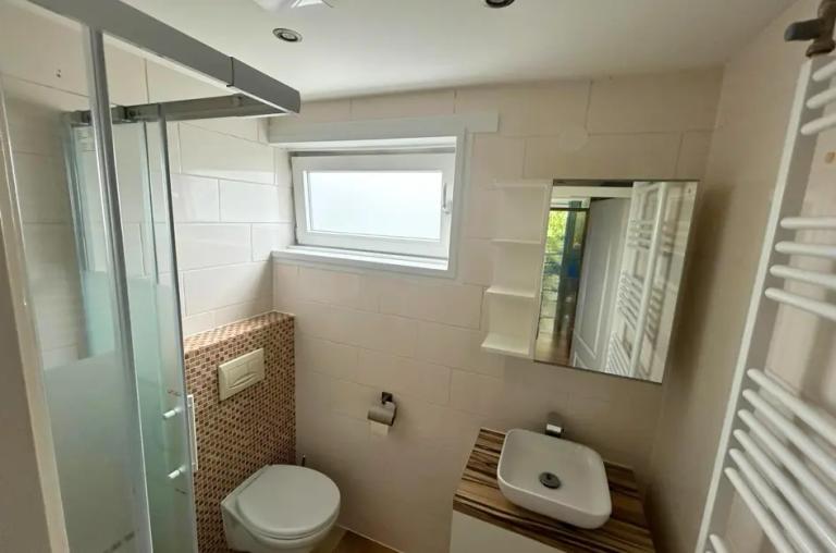 4-slaapkamer woning met garage en tuin - Afbeelding 10