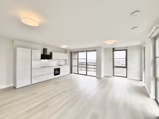Top Floor Apartment with Large Balcony