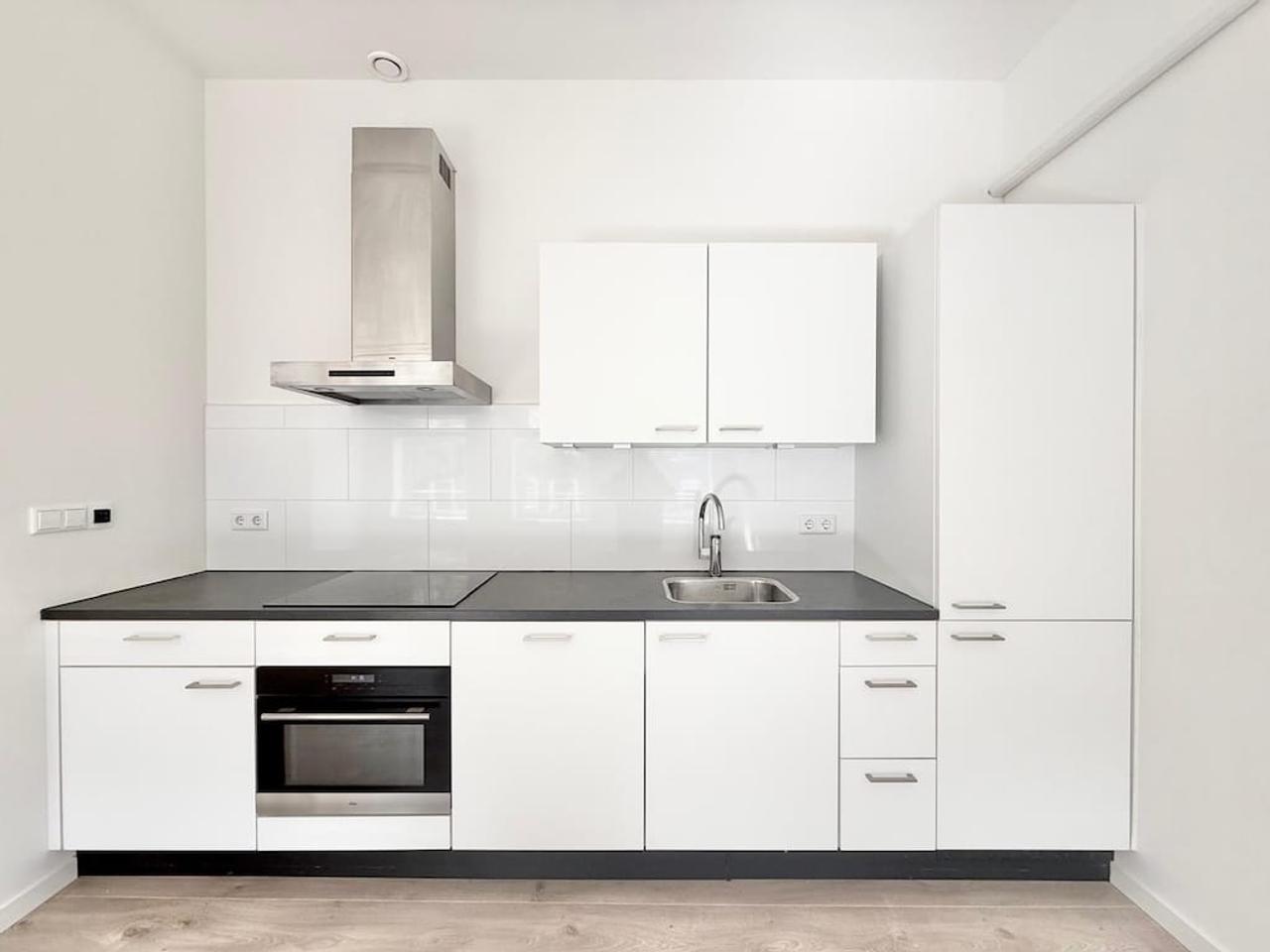 2-slaapkamer appartement met balkon op Nieuwe Binnenweg - Afbeelding 4