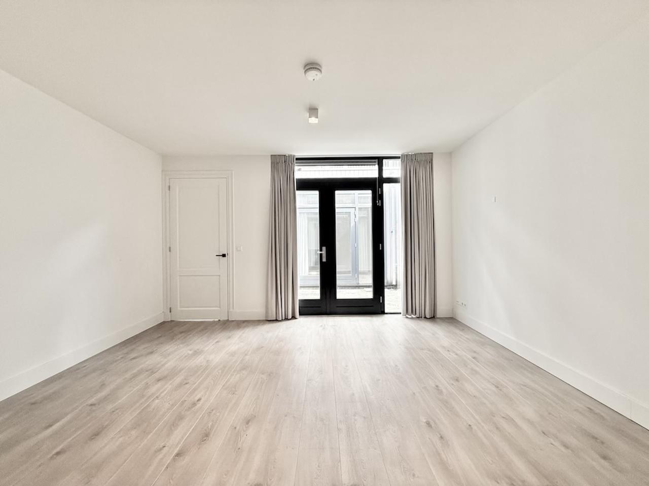 127 m² appartement met tuin in Oude Noorden - Afbeelding 9