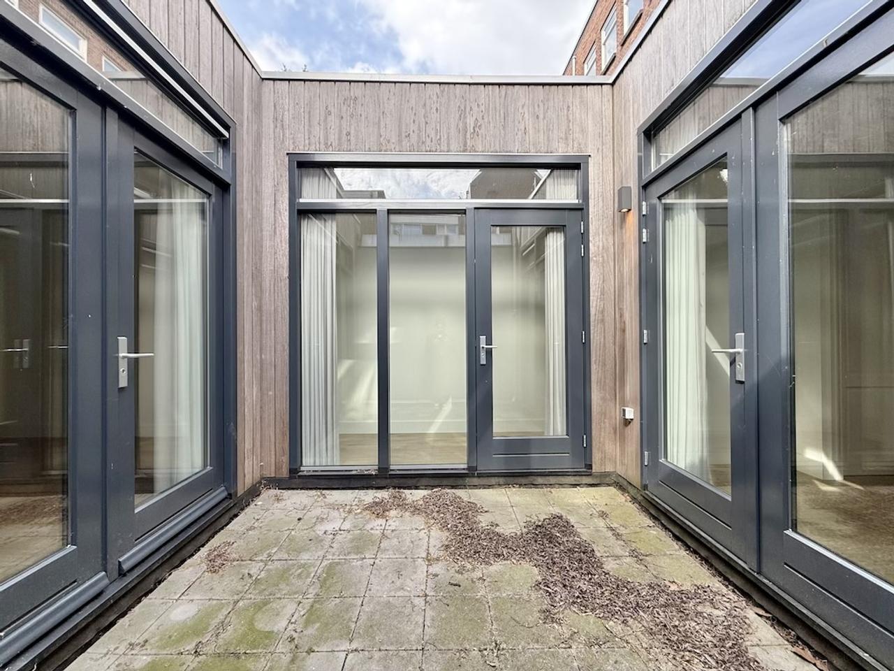 127 m² appartement met tuin in Oude Noorden - Afbeelding 12
