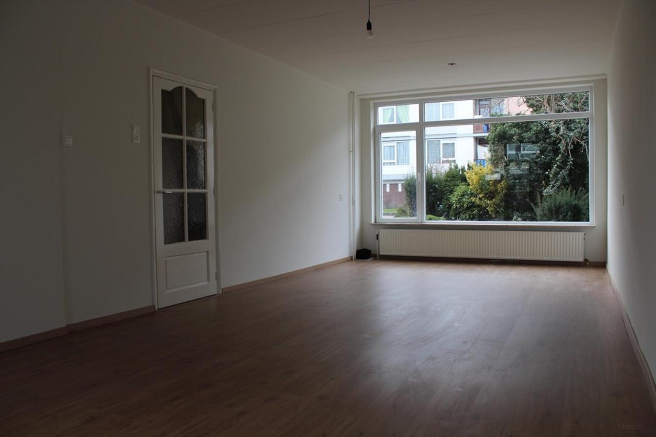 Tussenwoning met 4 slaapkamers en tuin - Afbeelding 3