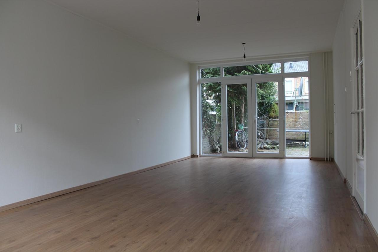 Tussenwoning met 4 slaapkamers en tuin - Afbeelding 4