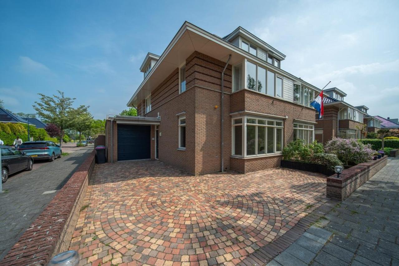 200 m² wonen met 4 slaapkamers en tuin - Afbeelding 1