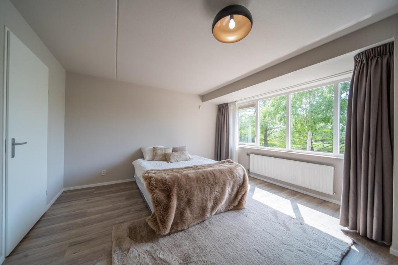200 m² wonen met 4 slaapkamers en tuin - Afbeelding 21