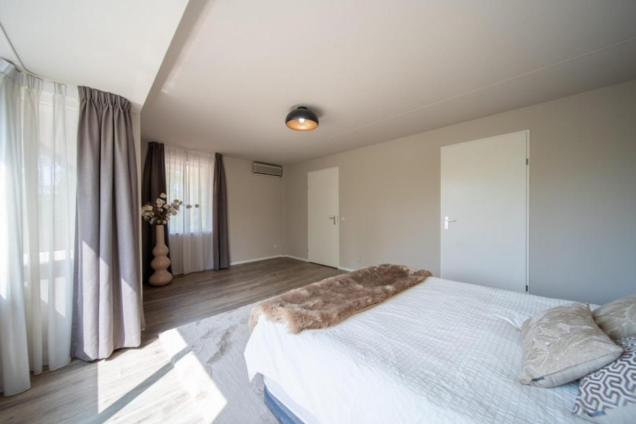200 m² wonen met 4 slaapkamers en tuin - Afbeelding 22