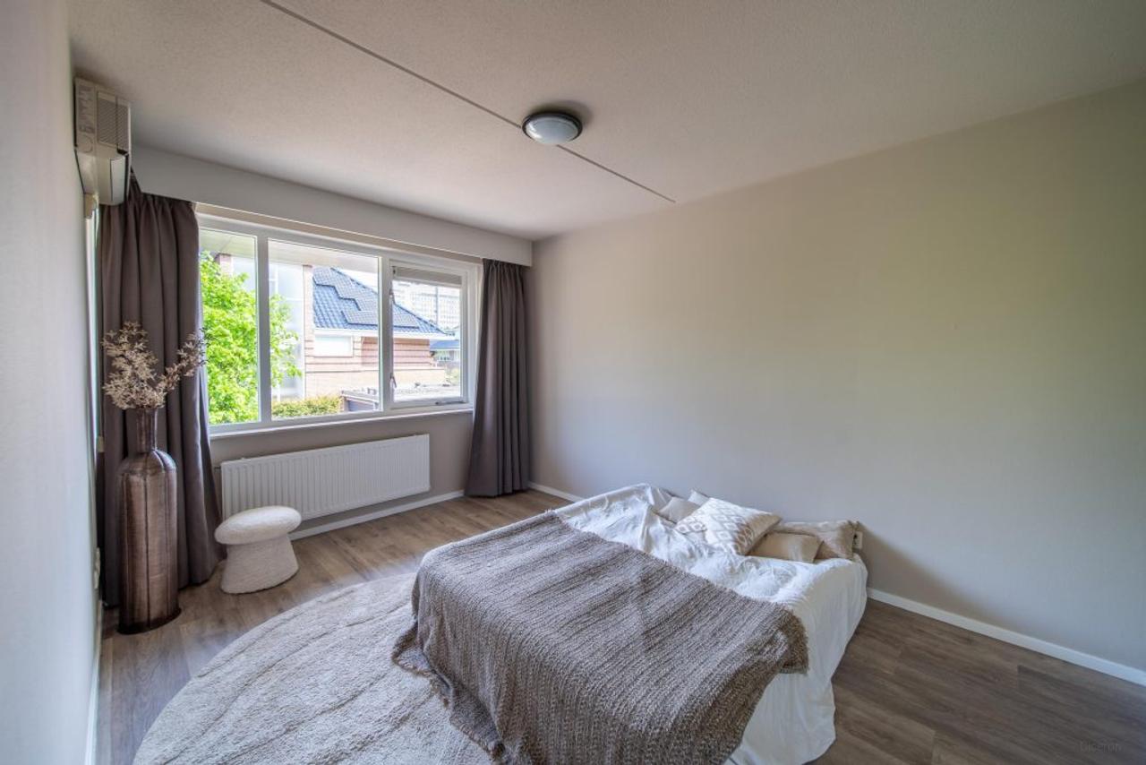 200 m² wonen met 4 slaapkamers en tuin - Afbeelding 26