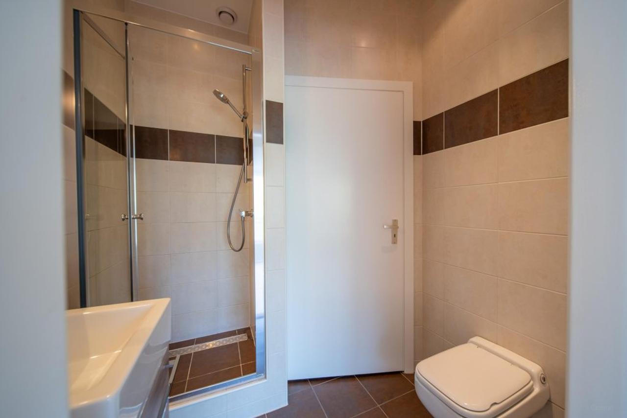 200 m² wonen met 4 slaapkamers en tuin - Afbeelding 39