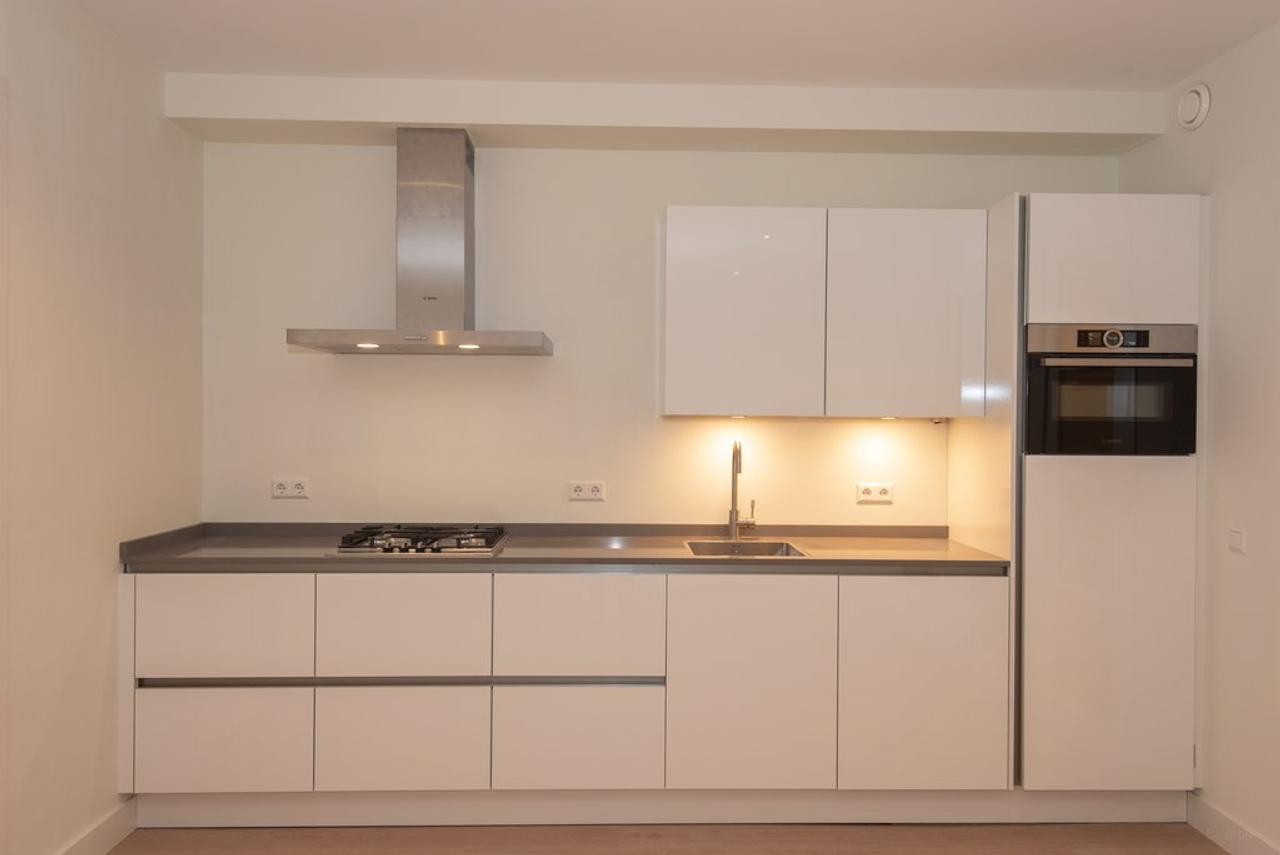 90 m² benedenwoning met tuin aan de gracht - Afbeelding 6