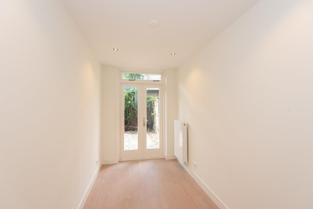 90 m² benedenwoning met tuin aan de gracht - Afbeelding 16