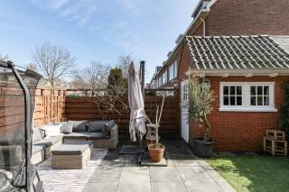 Gezinshuis met tuin in de Bloemenbuurt - Afbeelding 2