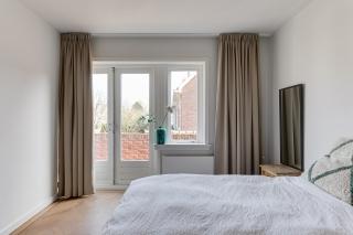 Gezinshuis met tuin in de Bloemenbuurt - Afbeelding 12