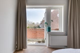 Gezinshuis met tuin in de Bloemenbuurt - Afbeelding 13