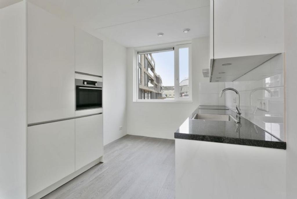 A+ huurwoning met tuin en parkeerplek - Afbeelding 2