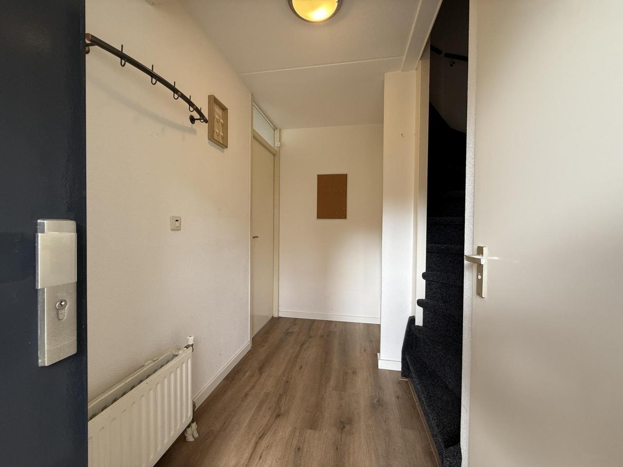 Tussenwoning met tuin in Rivierenkwartier - Afbeelding 2