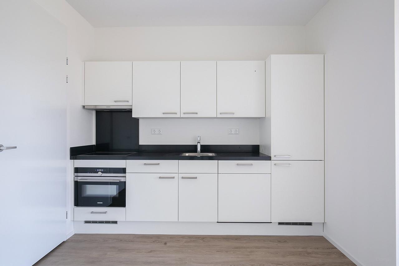 Gasloos 2-kamerappartement met zonbalkon - Afbeelding 9