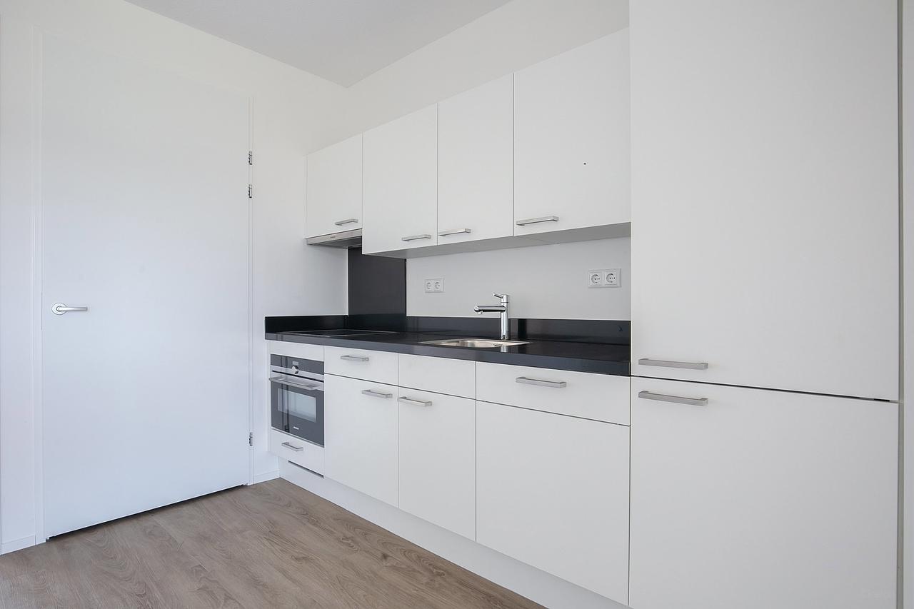 Gasloos 2-kamerappartement met zonbalkon - Afbeelding 10