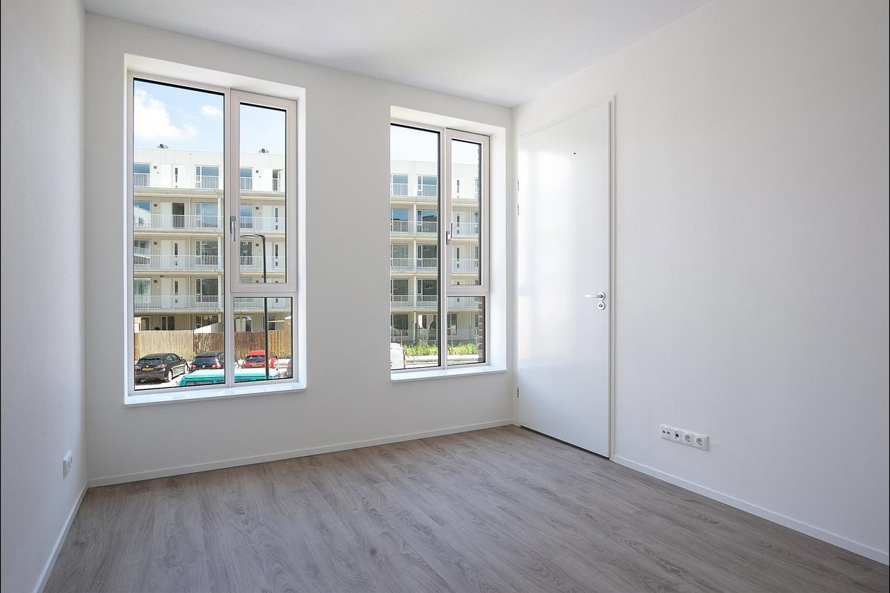 Gasloos 2-kamerappartement met zonbalkon - Afbeelding 13
