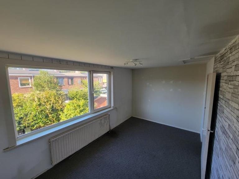 Eengezinswoning met 3 slaapkamers en tuin - Afbeelding 2