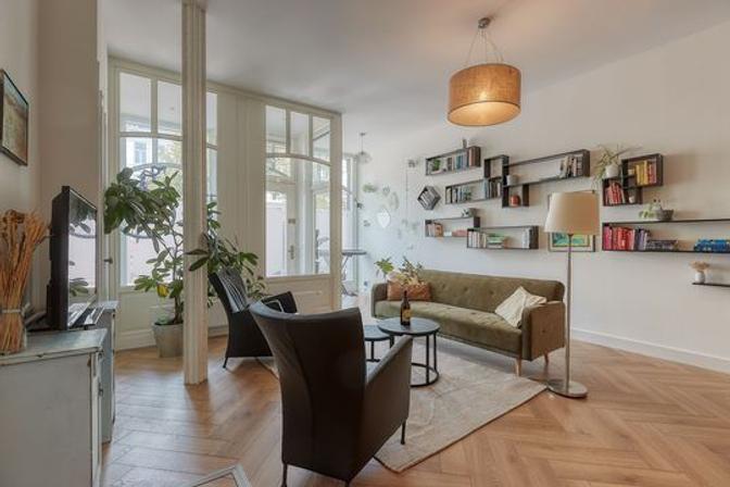 Gemeubileerde benedenwoning met tuin - Afbeelding 4