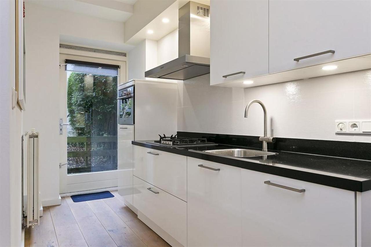 Begane grond appartement met tuin in de Jordaan - Afbeelding 5
