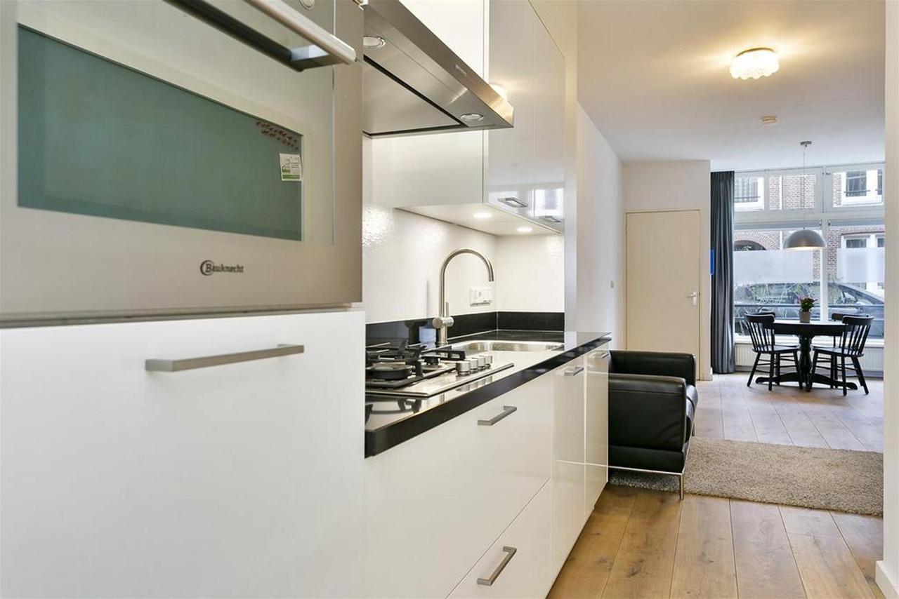 Begane grond appartement met tuin in de Jordaan - Afbeelding 7