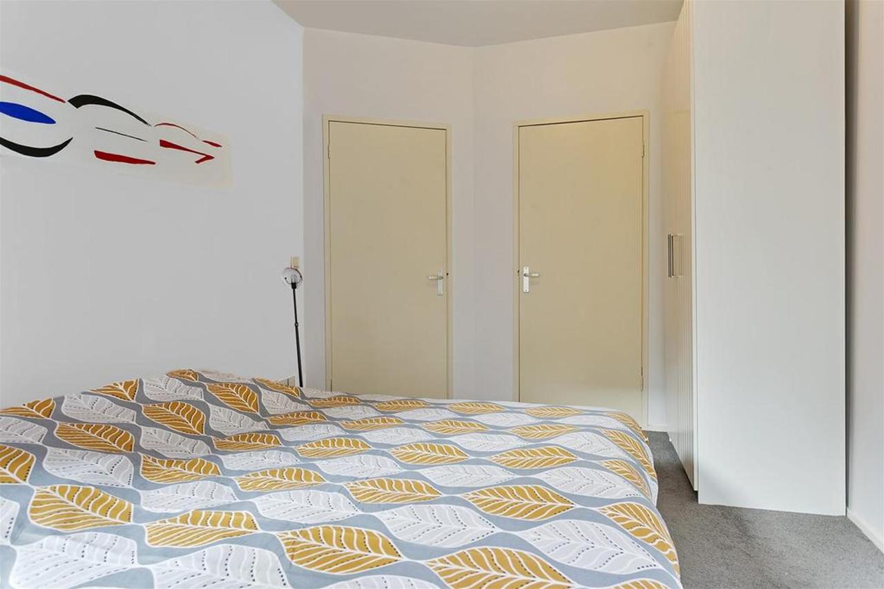 Begane grond appartement met tuin in de Jordaan - Afbeelding 11