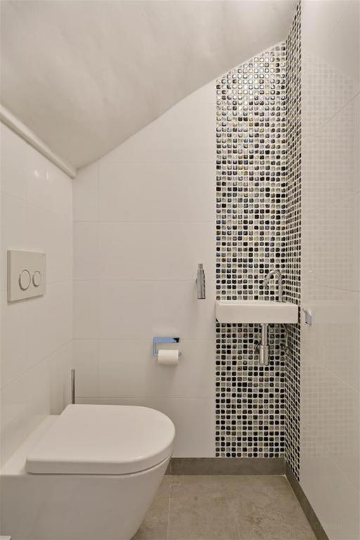 Begane grond appartement met tuin in de Jordaan - Afbeelding 14