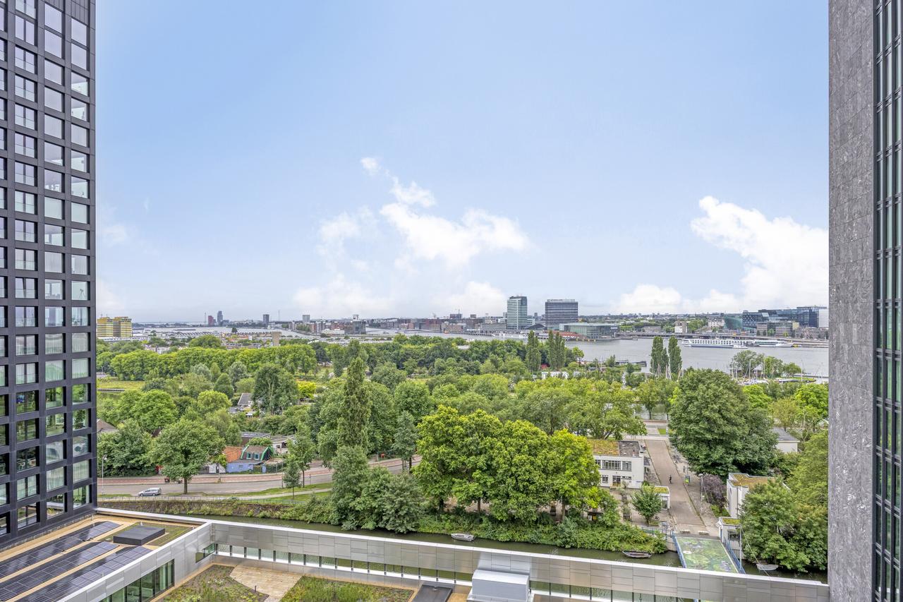 22e verdieping met groot balkon aan het IJ - Afbeelding 9