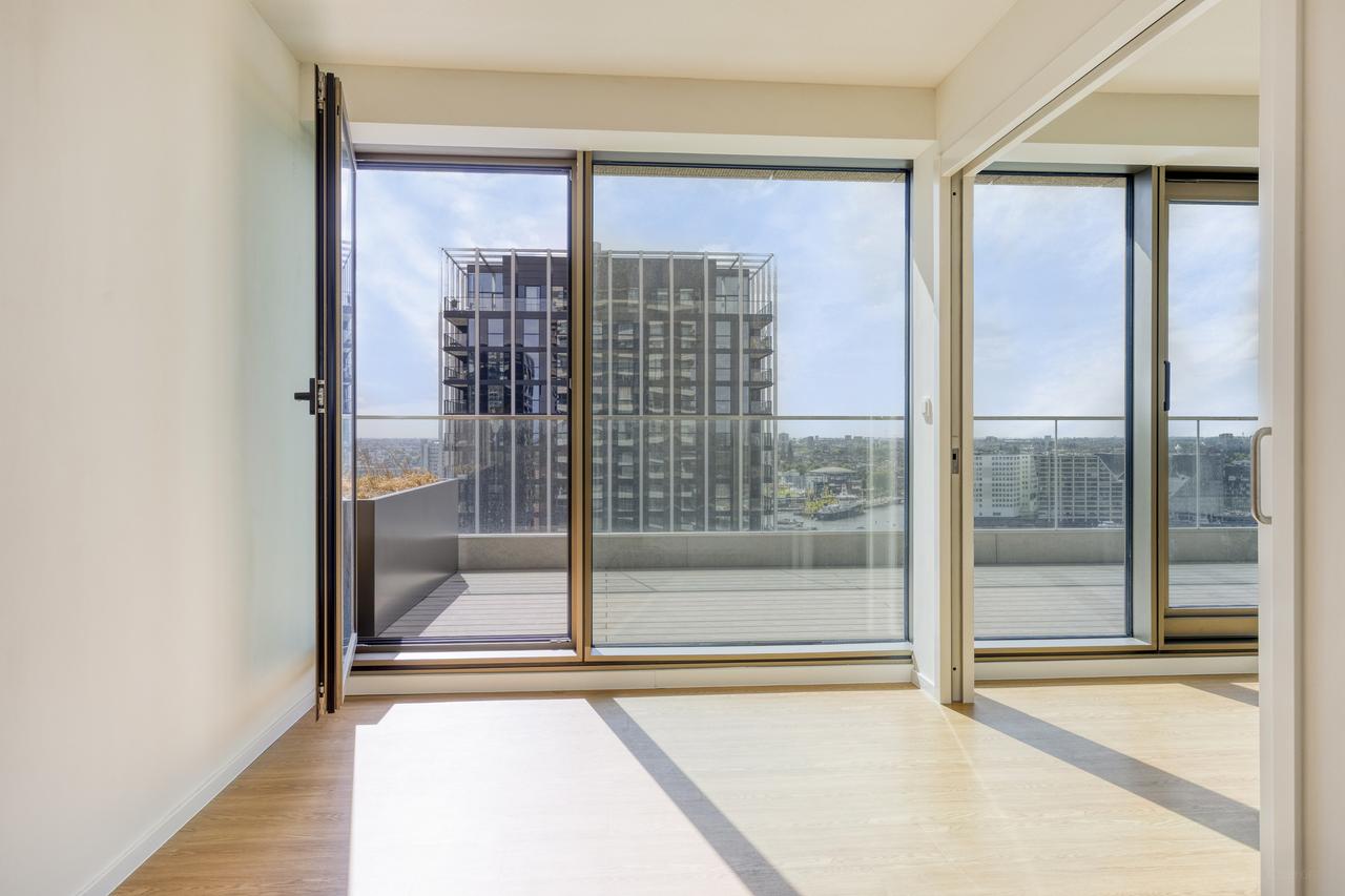Licht 2-kamerappartement met balkon en parkeerplek - Afbeelding 4