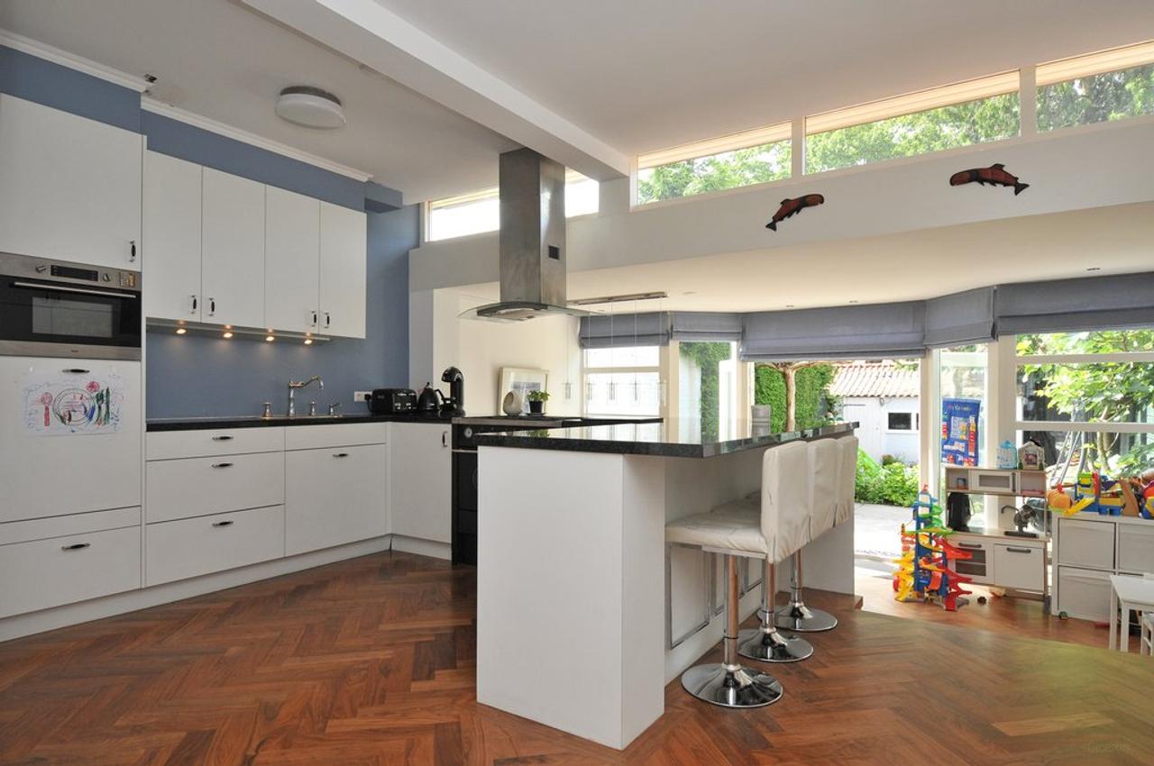 Uitgebouwde tussenwoning met woonkeuken - Afbeelding 5