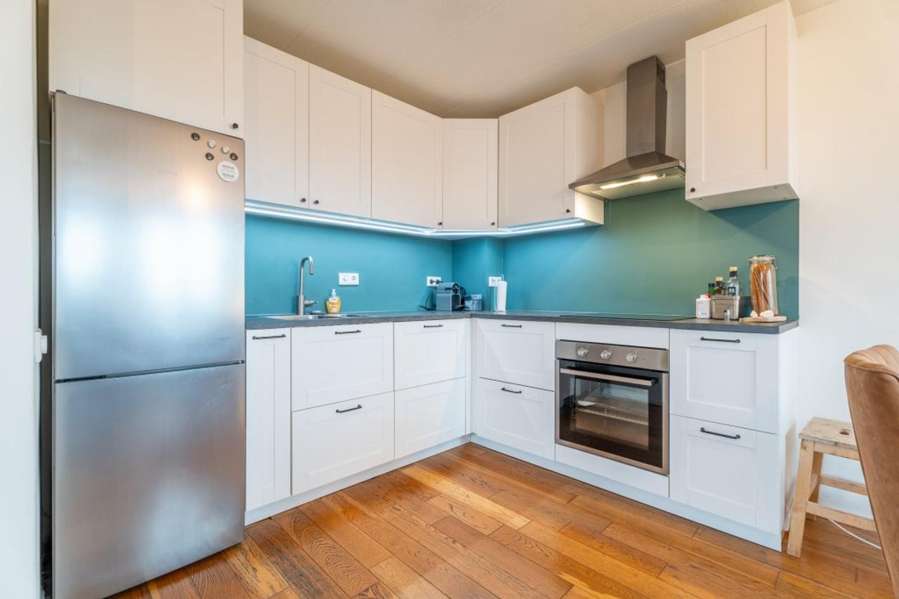 Furnished Apartment with Balcony in City Center - Image 11