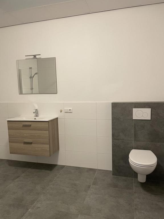 Gasloos appartement met patio in Maaswaard - Afbeelding 8